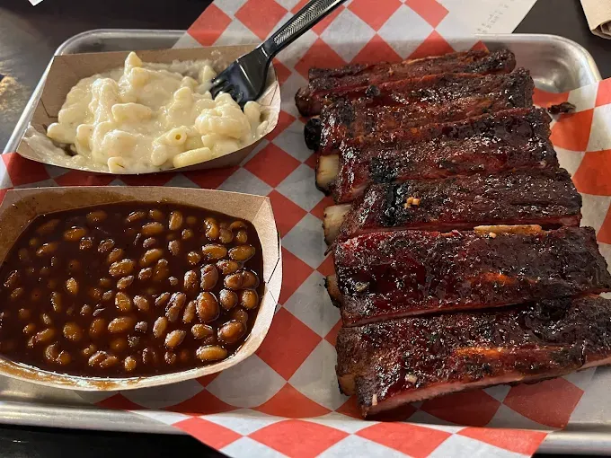 Rack of smoked ribs with mac and cheese and baked beans