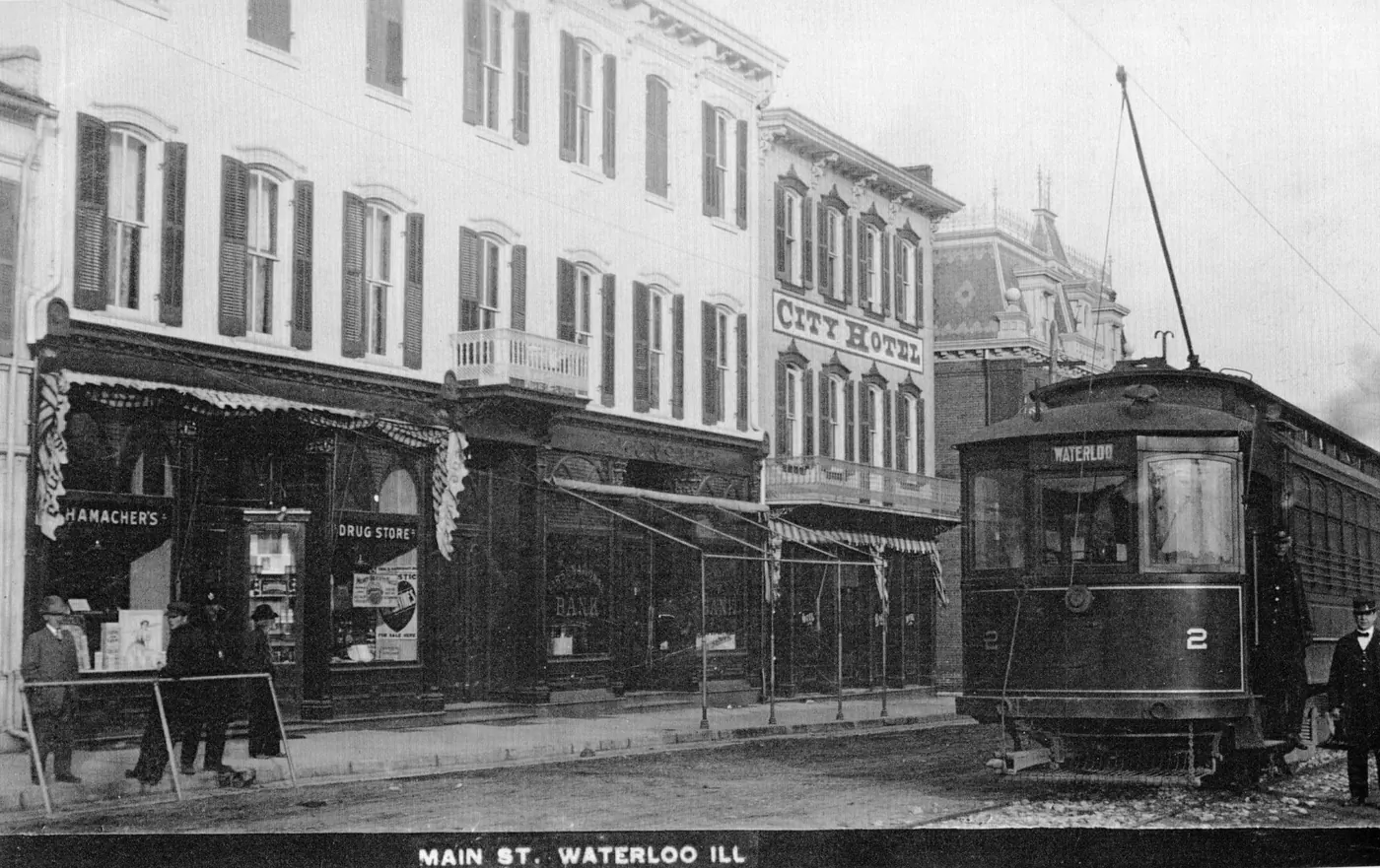 Main Street Waterloo, Illinois, showing the City Hotel, Hamacher's Drug Store and a streetcar
