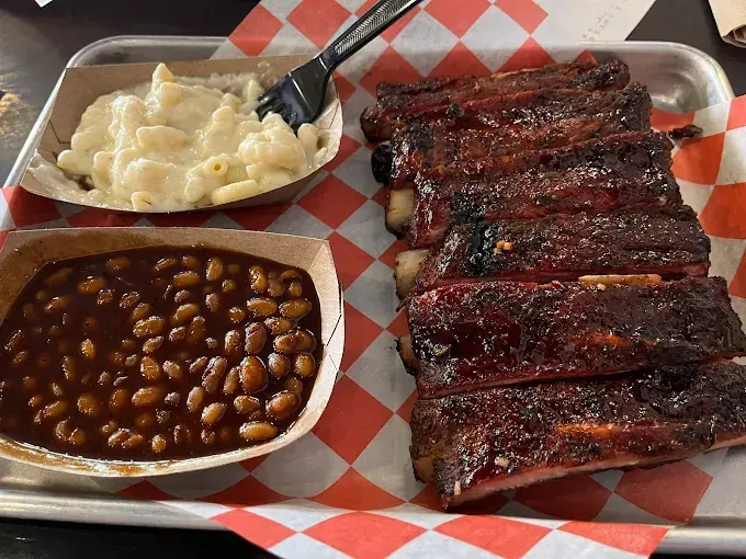 Rack of smoked ribs with mac and cheese and baked beans